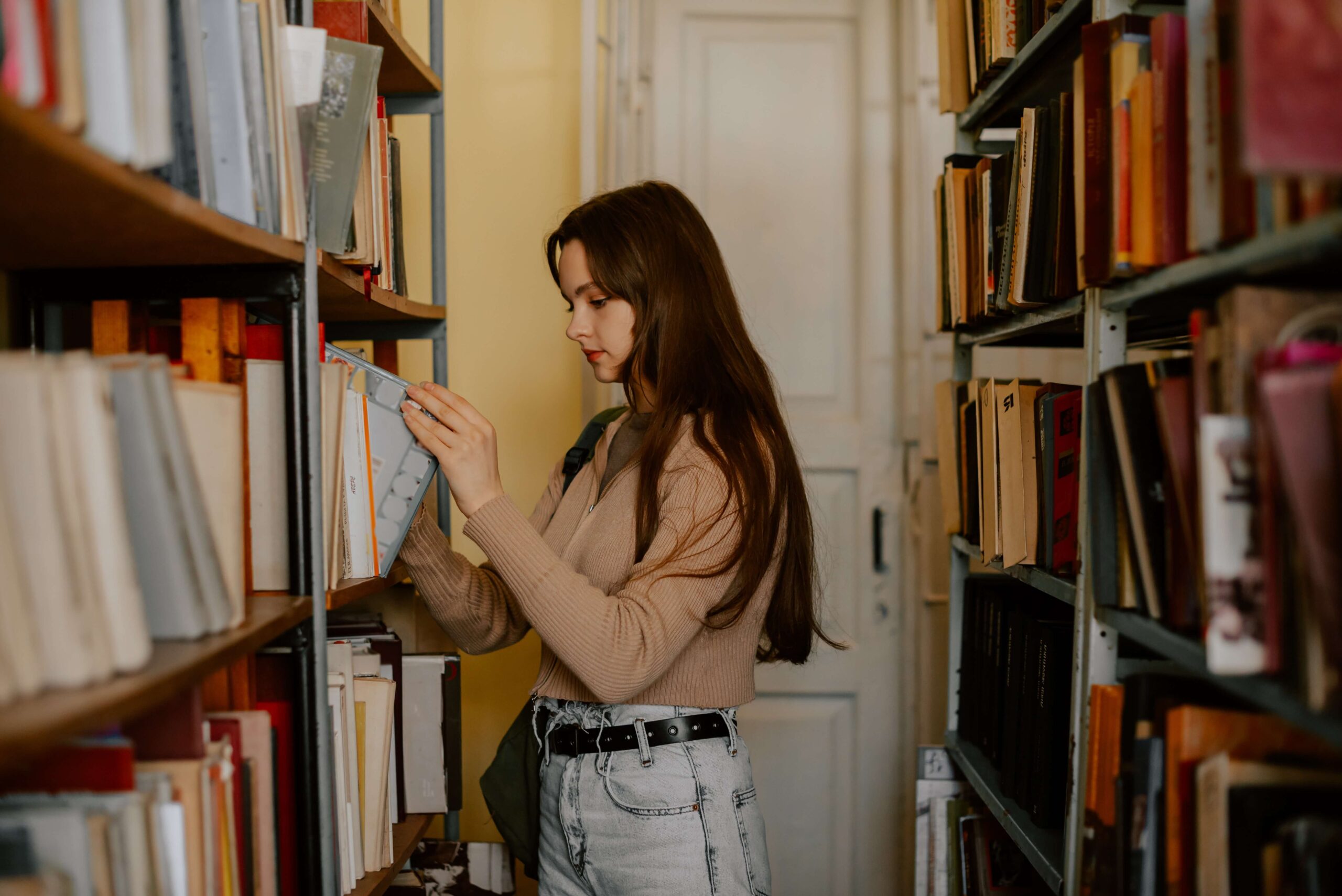 teenage girl in library