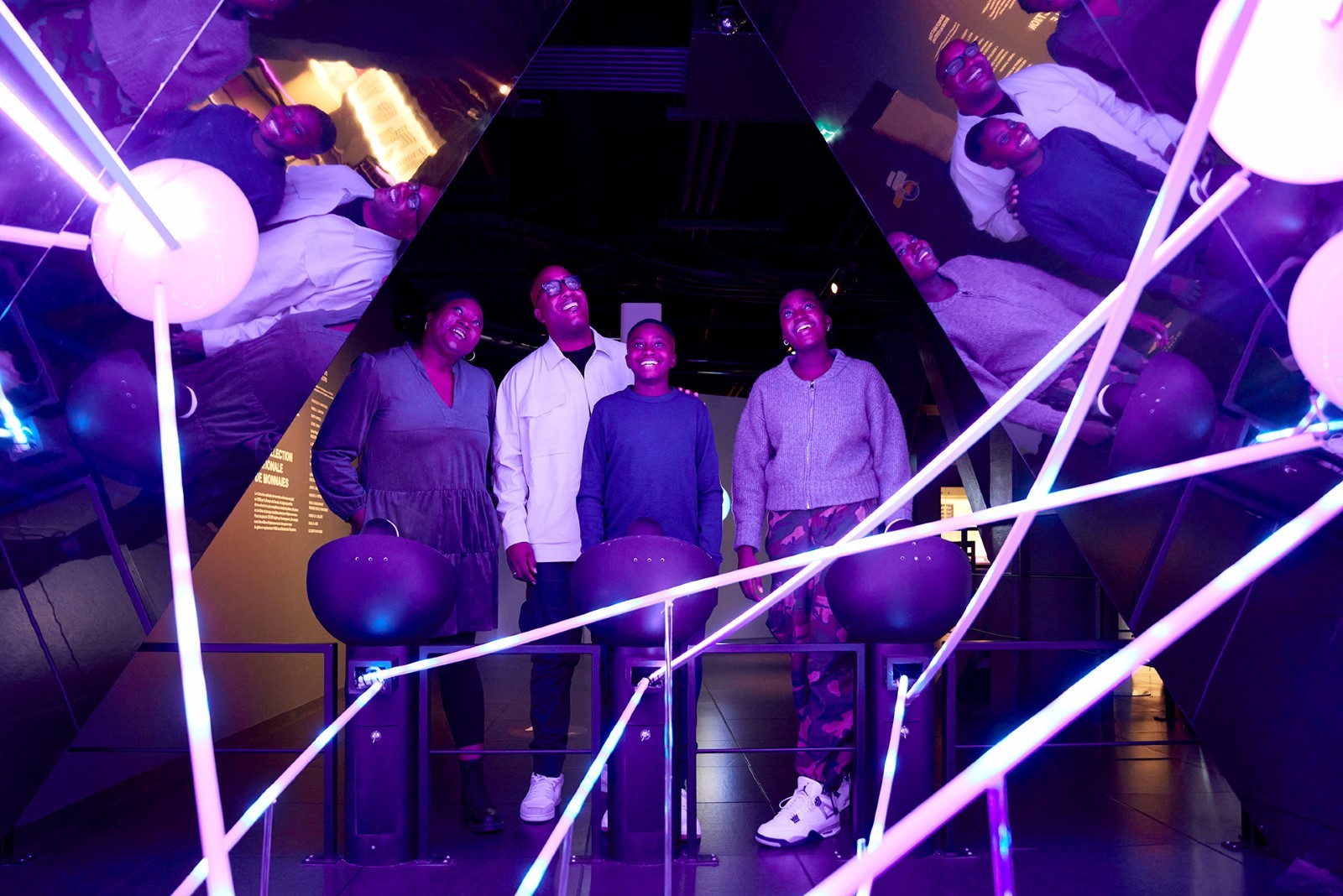 A family at the Bank of Canada Museum.