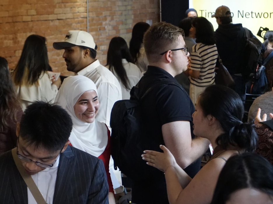 People connecting at a networking event with the King's Trust Canada.
